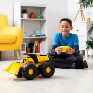 Boy playing with RC truck