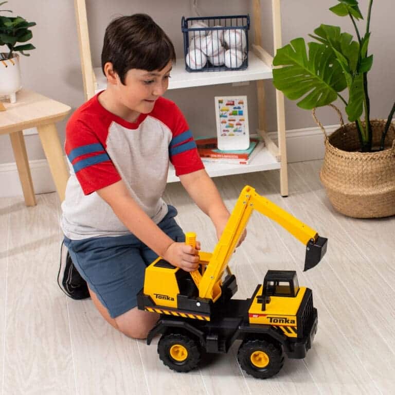 Boy playing with Mighty Excavator