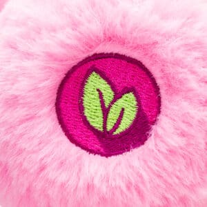 Close up of Care Bears Cheer Bear's foot emblem.