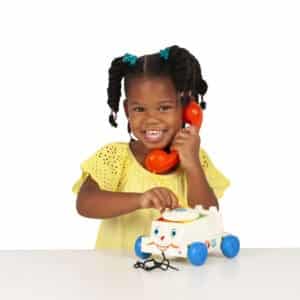 Fisher-Price Chatter Phone | girl holding phone to ear