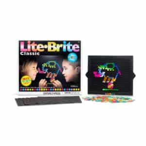 Classic Lite Brite with colorful pegs, stencils, and box on white background.