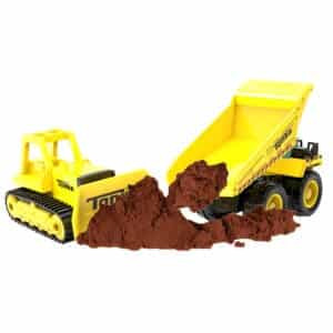 Two Tonka Monster Metal Movers with play dirt