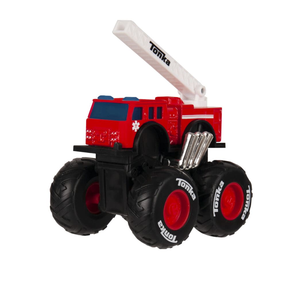 Tonka Monster Metal Mover Fire Truck angle view against white background.