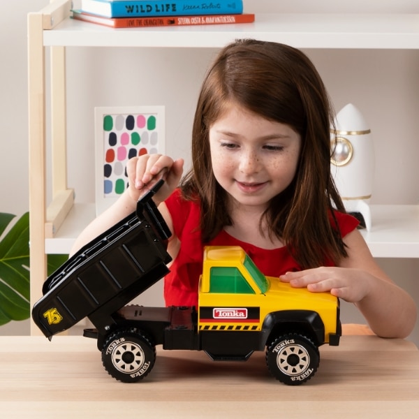 girl with quarry truck