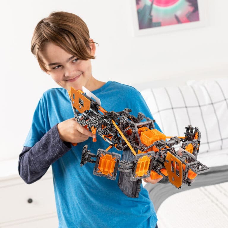 Boy playing with K'NEX Crossover Legacy