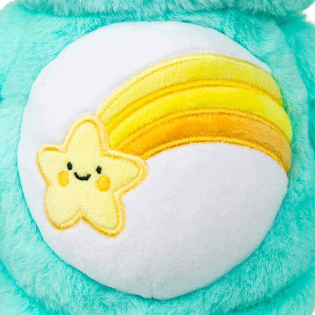 Close up of light blue Wish Bear's stomach with a yellow shooting star stomach patch.