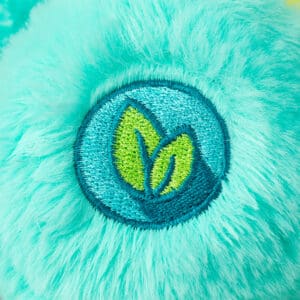 Close up of light blue Wish Bear's blue patch on foot.