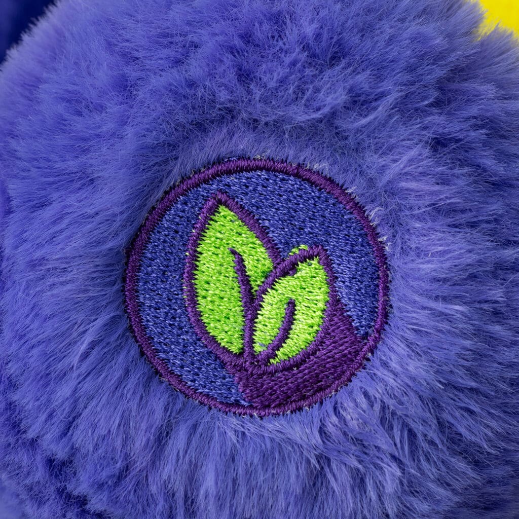 Close up of violet Harmony Bear's patch on foot.