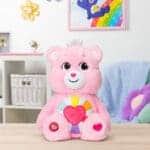Pink Hopeful Heart Bear sitting on desk