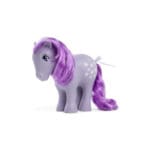 Purple My Little Pony with purple hair and flower cutie mark against white background.