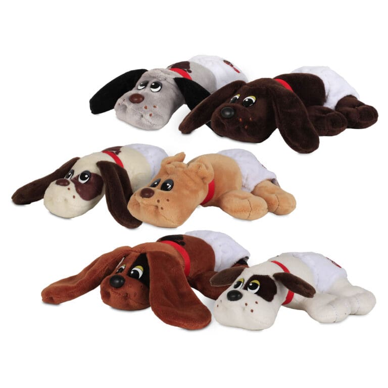 Group of six puppies in diapers