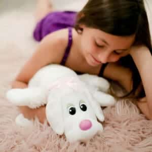 Girl playing with Pound Puppies