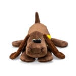 Classic Pound Puppies Plush Zany laying down against white background.