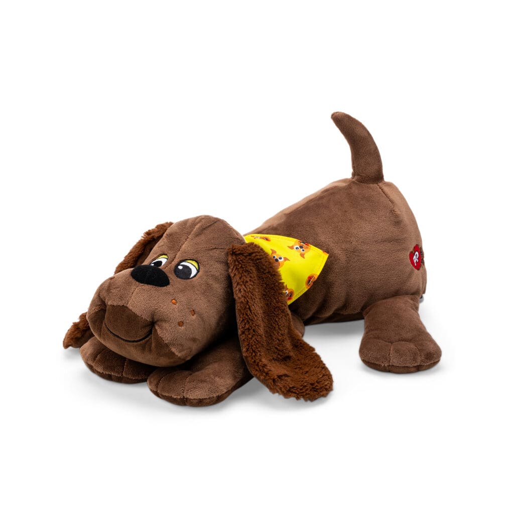Classic Pound Puppies Plush Zany laying down against white background.