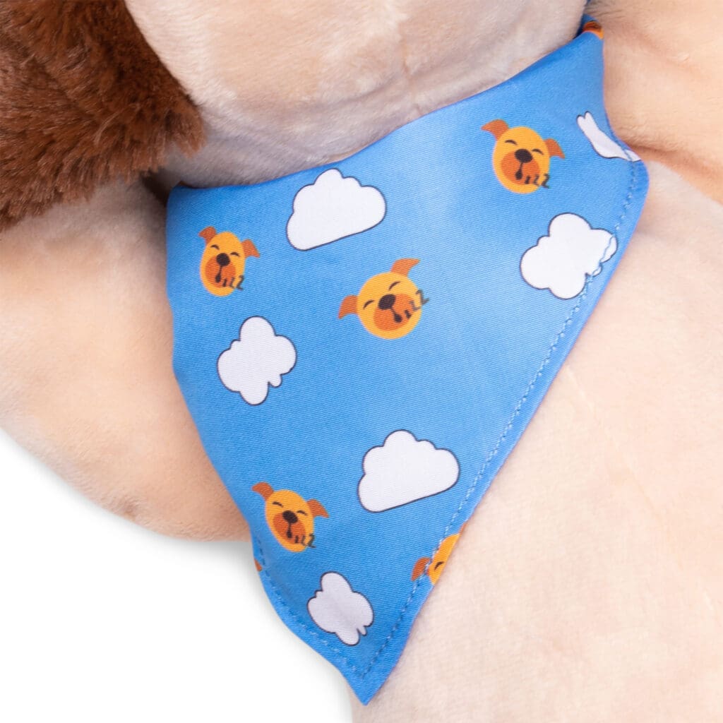 Close up of Classic Pound Puppies Plush Sleepy laying down against white background.