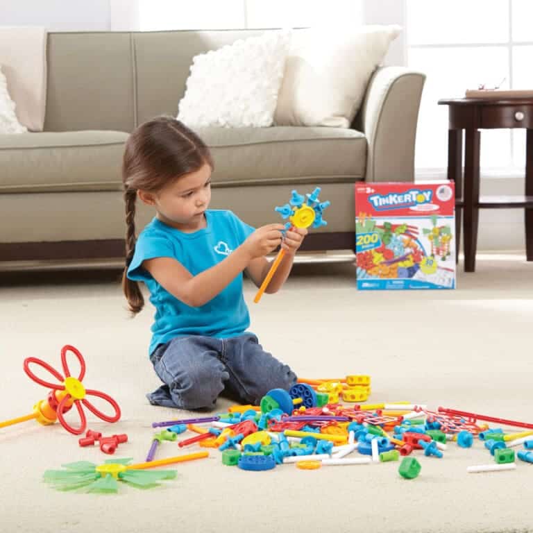 Girl playing with tinker toys