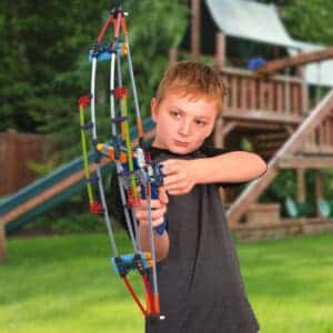 Boy playing with K'NEX Battle Bow