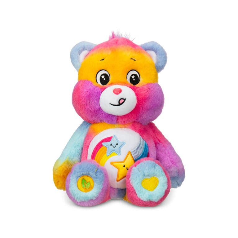 A purple Dare to Care Bear plush toy from the Care Bears collection is shown against a plain white background. The toy features two intertwined stars on its belly and has a cheerful expression.