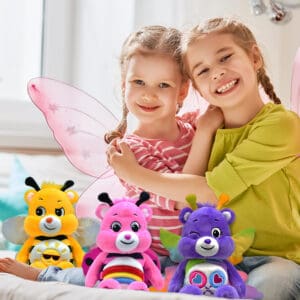 Three colored Spring Theme bee Funshine Bears are being played with by two young girls.