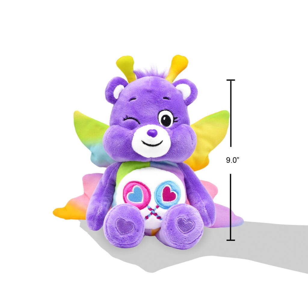 A purple Share Bear plush toy from the Care Bears collection is shown against a plain white background, highlighting its height of 9".