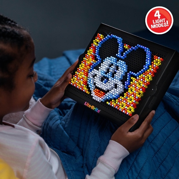 Girl with Lite Brite disney 100