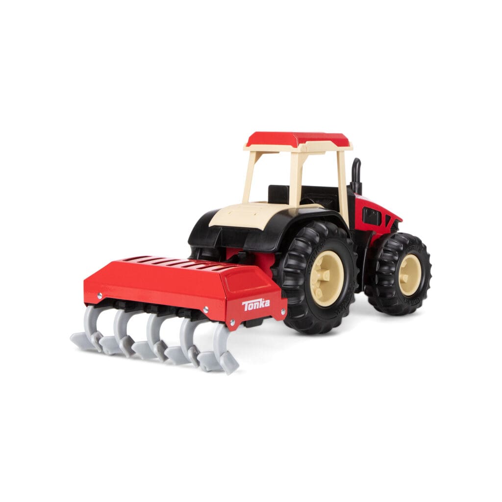 Tonka Steel Classics Tractor & Plow against white background