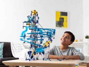 Young boy playing with K'nex Marble Coaster Run with Motor.