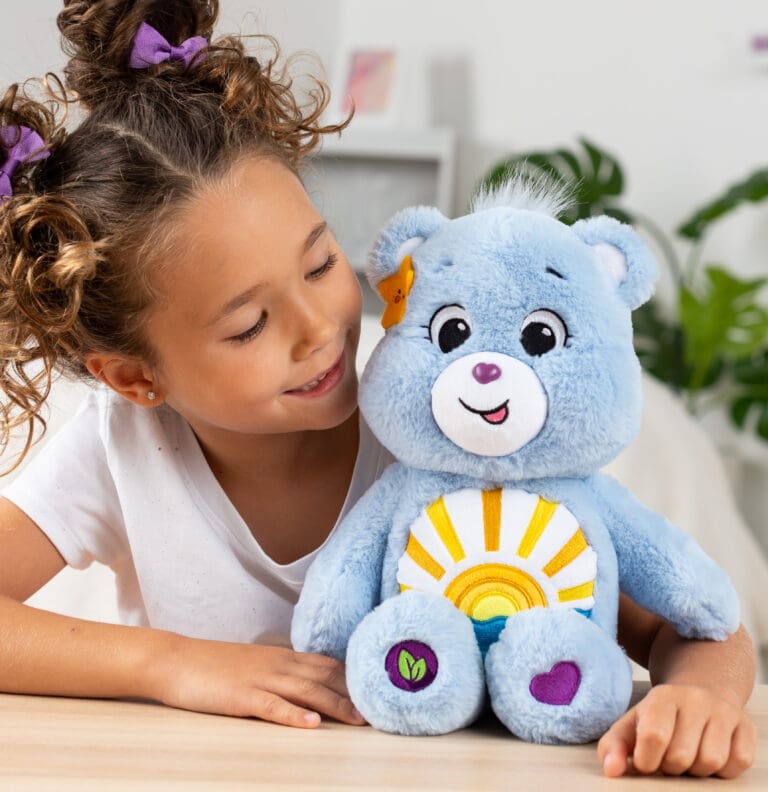 Girl with Care Bears Sea Friend Bear