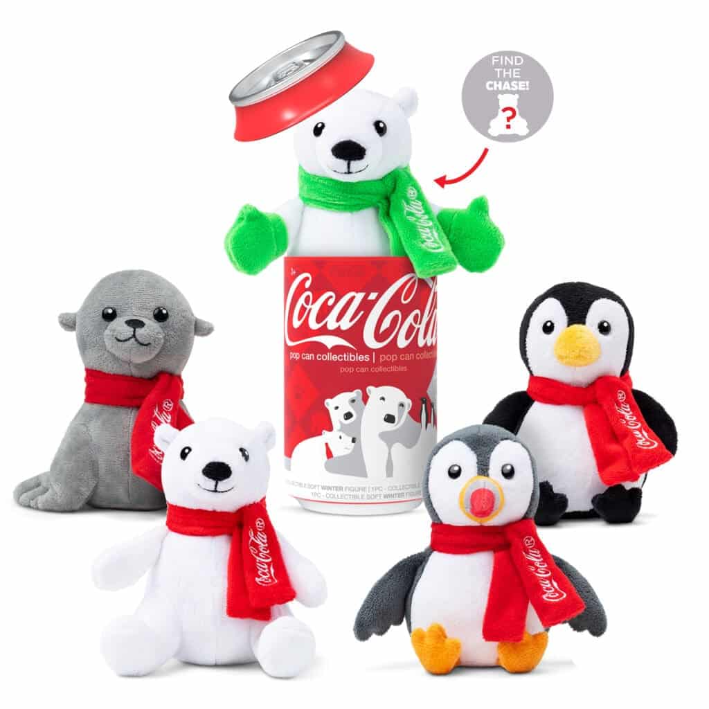Coca-Cola Pop Cans Collectables, one toy in can and four not.
