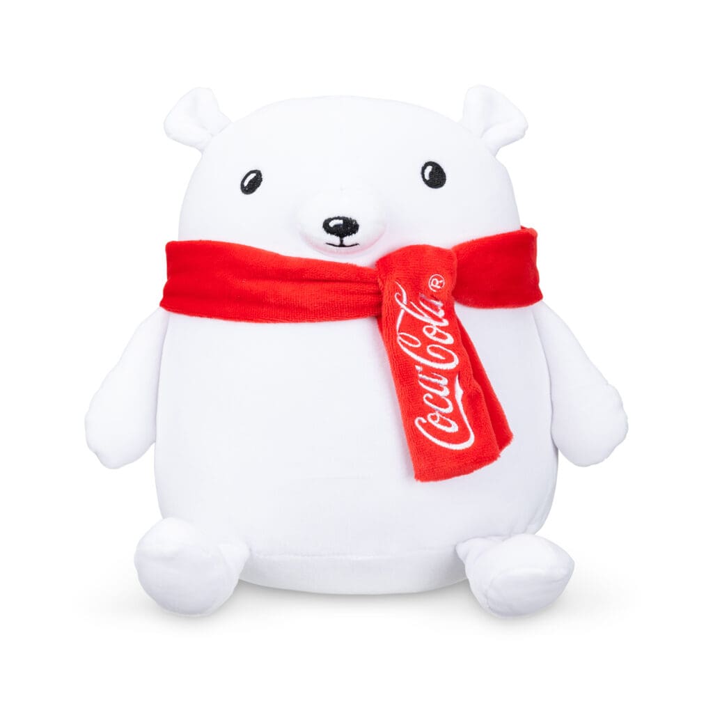 Coca-Cola Trendy Bear with red scarf against white background.