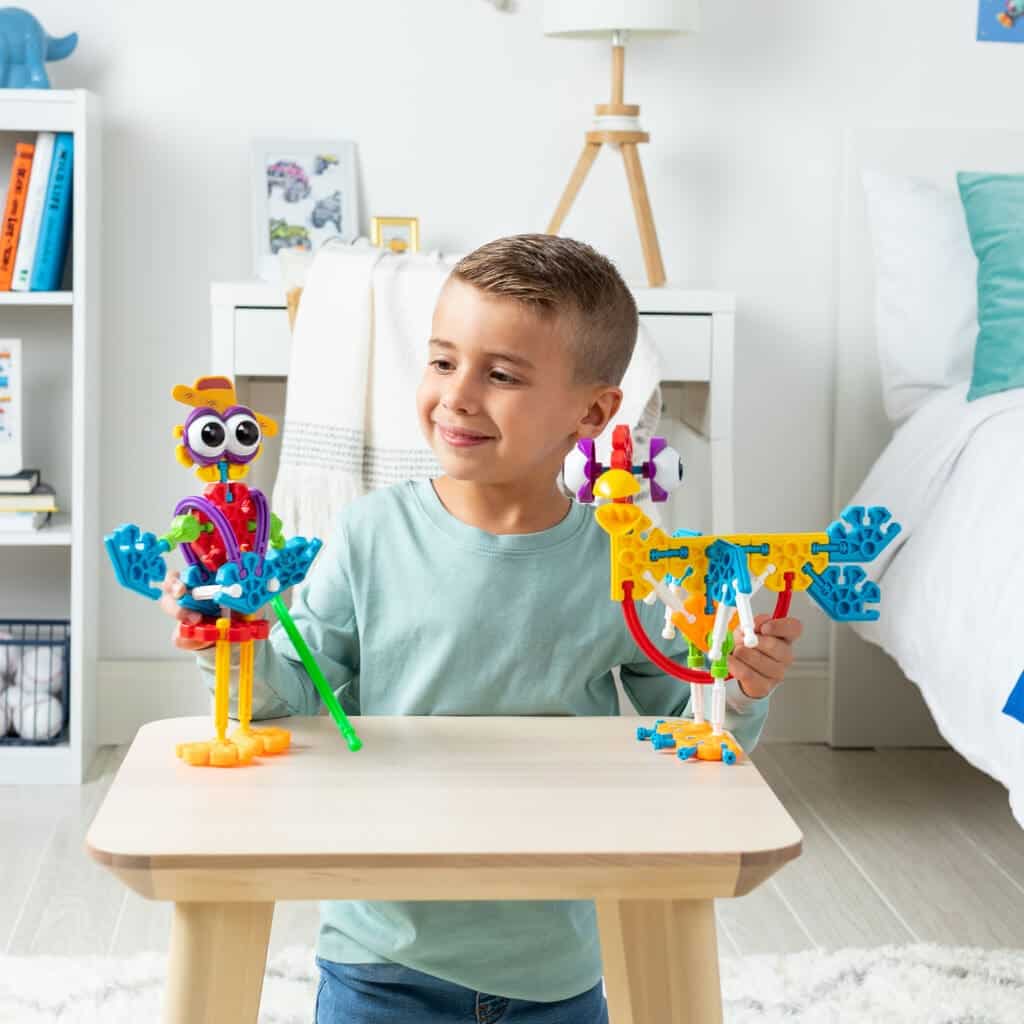 Young boy with K'nex Farmin' Friends Building Set.