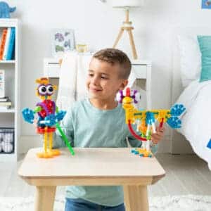 Young boy with K'nex Farmin' Friends Building Set.