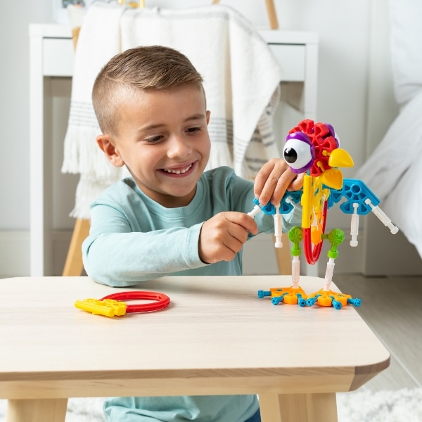 Young girl with K'nex Farmin' Friends Building Set.