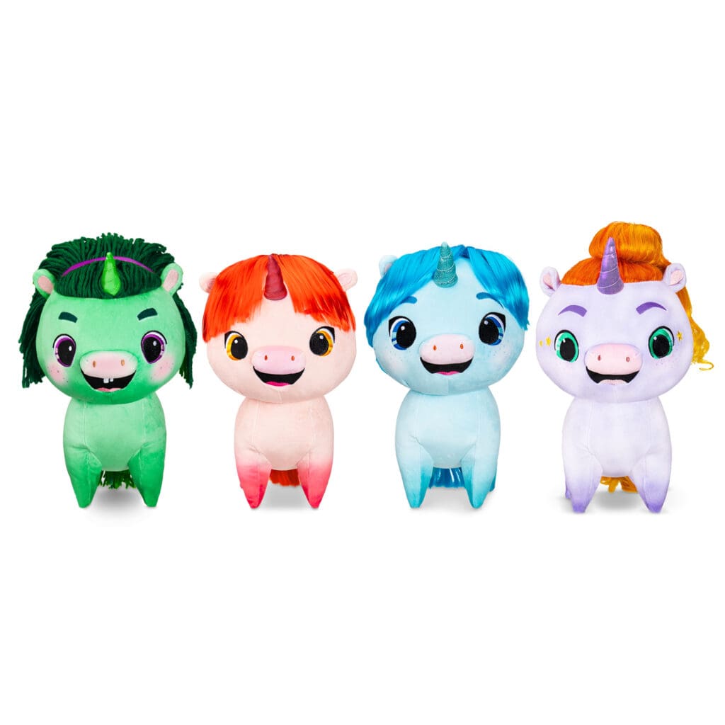 Four Not Quite Narwhal Jinglehooves plushies of different colors against white background.