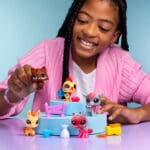 LPS Farm Besties Collector Set being played with by young girl.