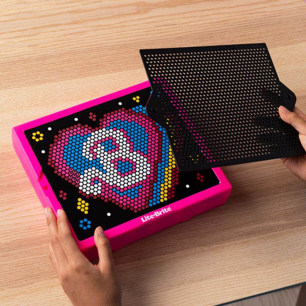 Lite Brite Super Brite HD Barbbie Edition being played with by young girl.