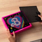 Lite Brite Super Brite HD Barbbie Edition being played with by young girl.