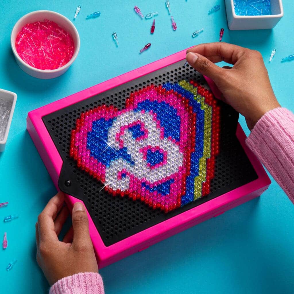 Lite Brite Super Brite HD Barbbie Edition being played with by young girl.