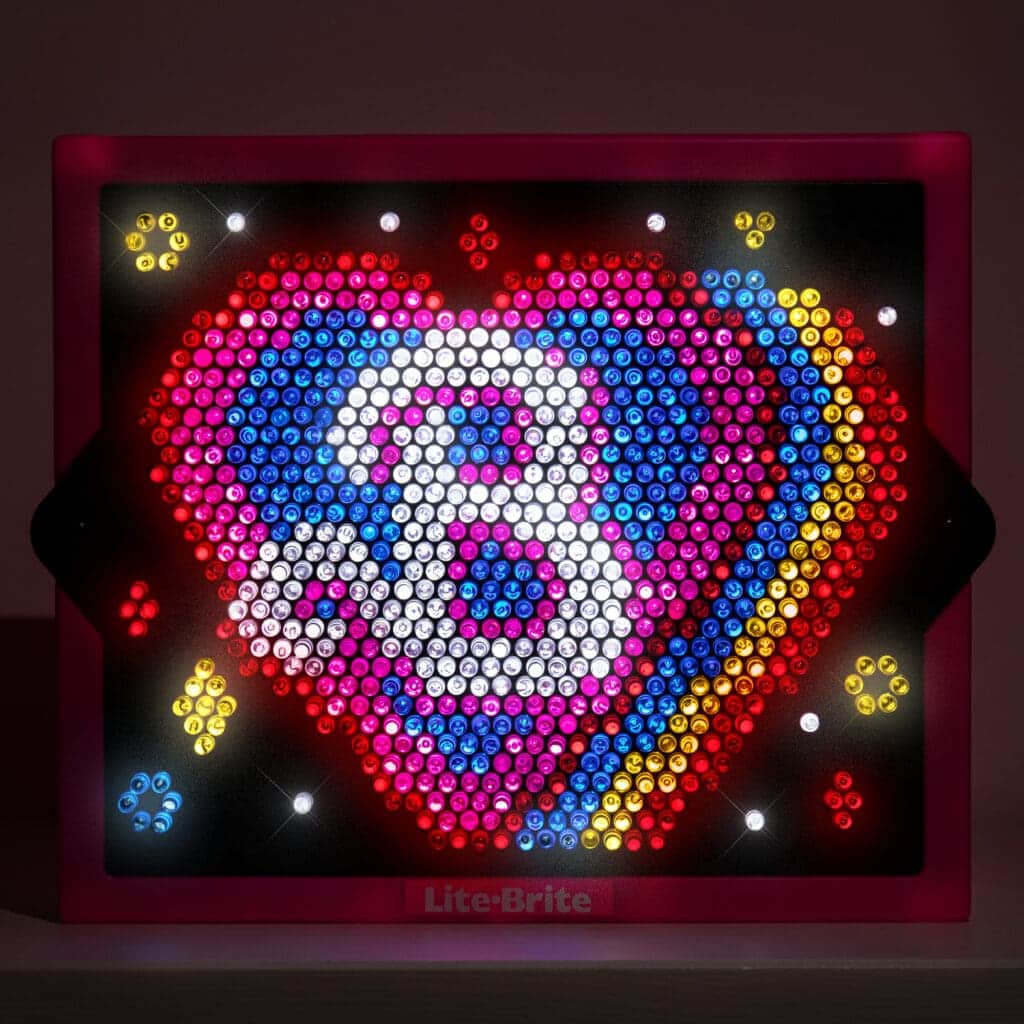 Lite Brite Super Brite HD Barbbie Edition lit up.