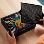 Lite Brite Super Bright HD Pokémon Edition being held by young boy.