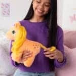 MLP Applejack Unicorn and Pegasus being played with by young girl.