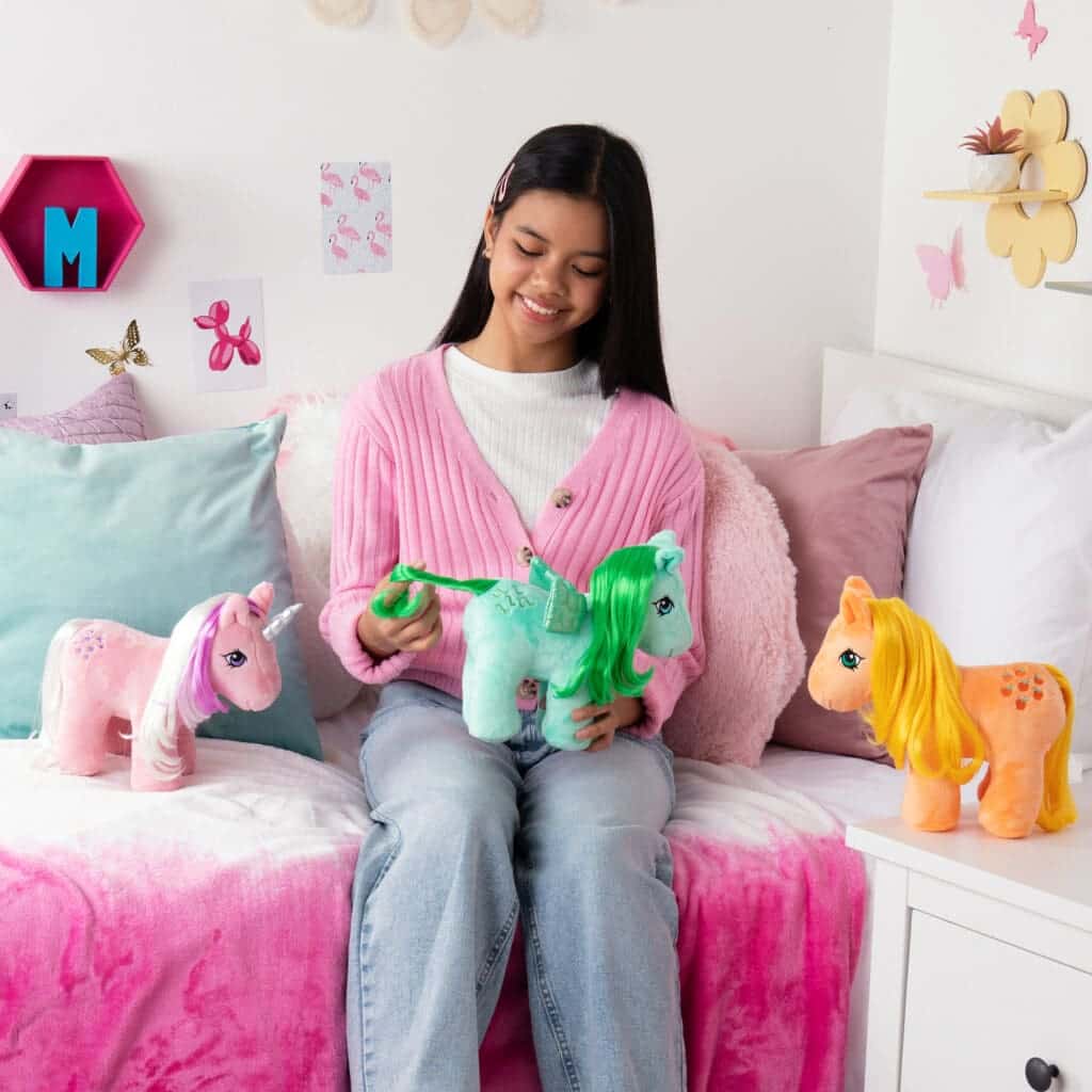 My Little Pony Trio being played with by young girl.
