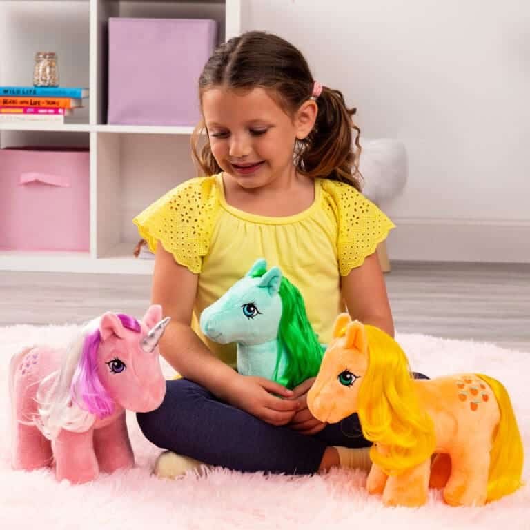 My Little Pony Trio being played with by young girl.