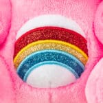 Care Bears Funsize Hello Kitty Cheer Bear plush displayed on a white background, featuring a unique combination of Care Bears and Hello Kitty designs, with a colorful rainbow emblem on its stomach.