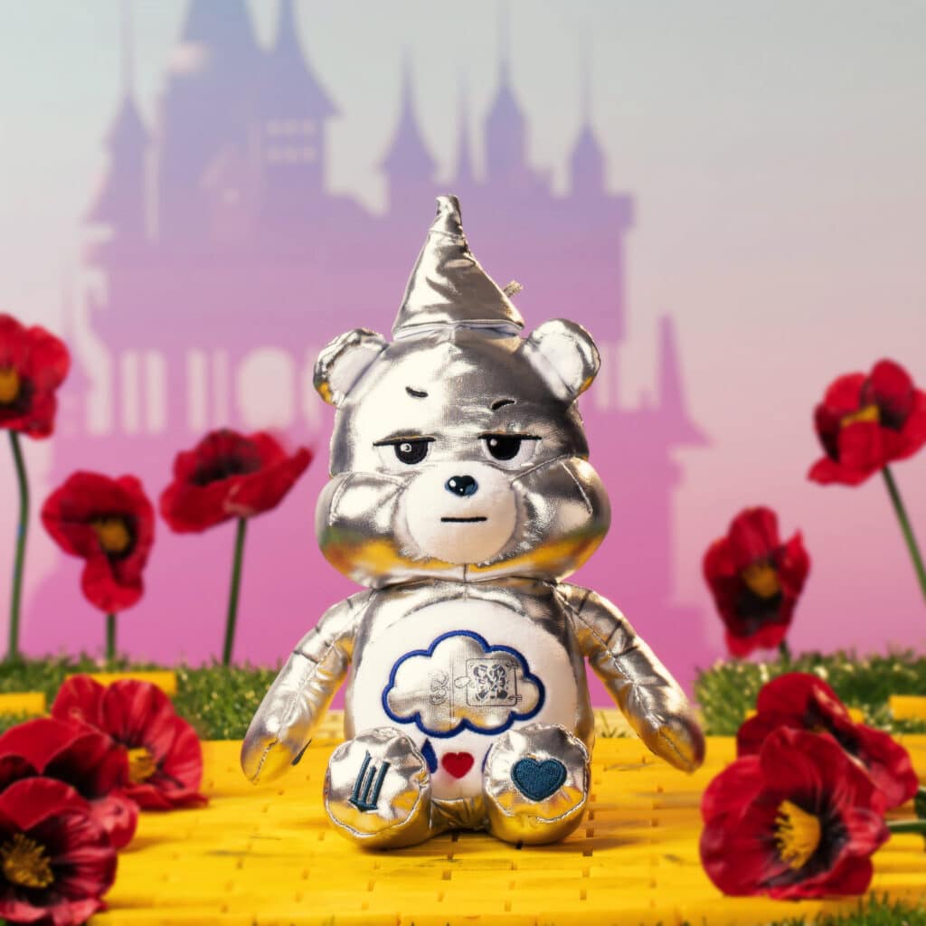 Close up front facing sitting photo of the Tin Man Care Bear