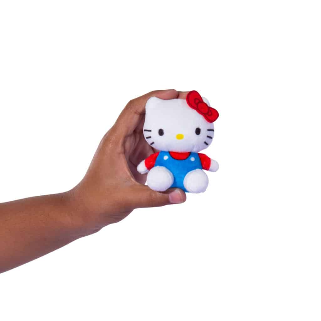 Micro Teenies Hello Kitty compared to hand for size reference