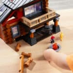 Close up of the Lincoln Logs Beechwood Retreat displaying the people and camp fire