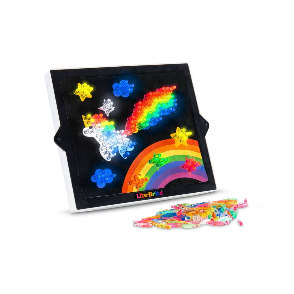 Lite-Brite Classic, Bold & Bright Edition with all the pieces next to it