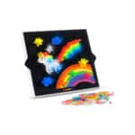 Lite-Brite Classic, Bold & Bright Edition with all the pieces next to it