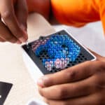 Someone playing with the Lite Brite Mini, Stitch